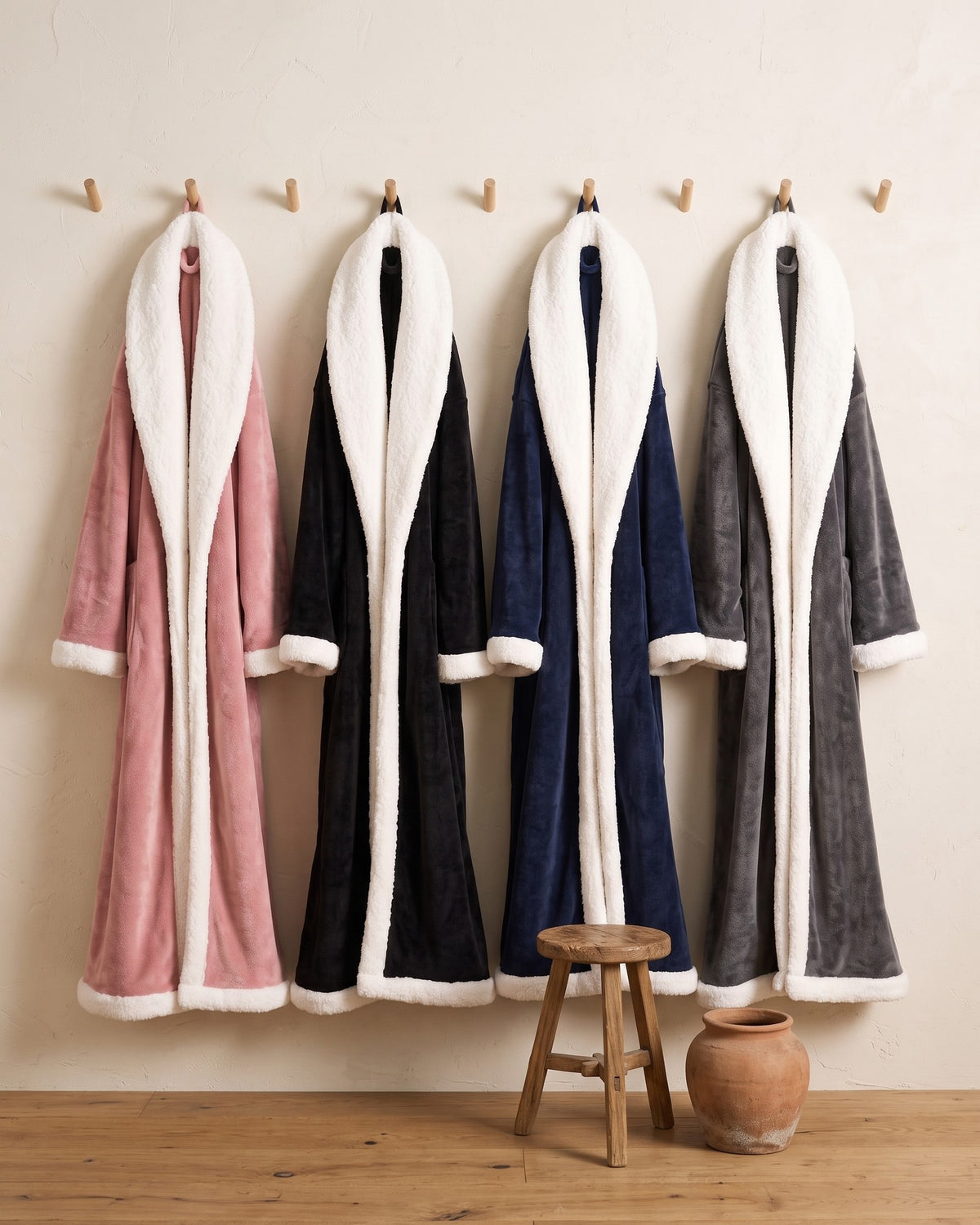 All four Hugwarm colours hanging side by side: Pink, Black, Navy Blue, Charcoal Grey
